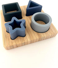 Load image into Gallery viewer, 4 in 1 Teething Puzzle Colours and Shapes Set | Montessori Developmental Toy | Learn Colours Shapes | Natural Timber Base and Food Grade Silicone | Dishwasher Safe Shapes