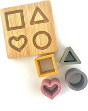 Load image into Gallery viewer, 4 in 1 Teething Puzzle Colours and Shapes Set | Montessori Developmental Toy | Learn Colours Shapes | Natural Timber Base and Food Grade Silicone | Dishwasher Safe Shapes